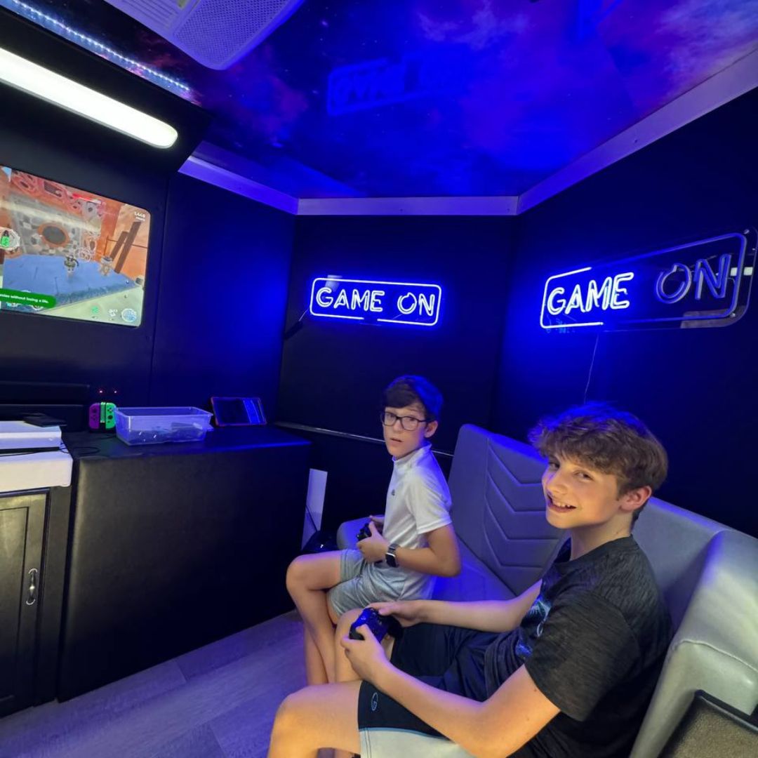 video game truck, mobile gaming, party entertainment, birthday party, corporate event, family fun, game truck rental, gaming experience, Atlanta, Georgia, luxury gaming, PlayStation, Xbox, Nintendo Switch, virtual reality, video games, fun, excitement, celebration