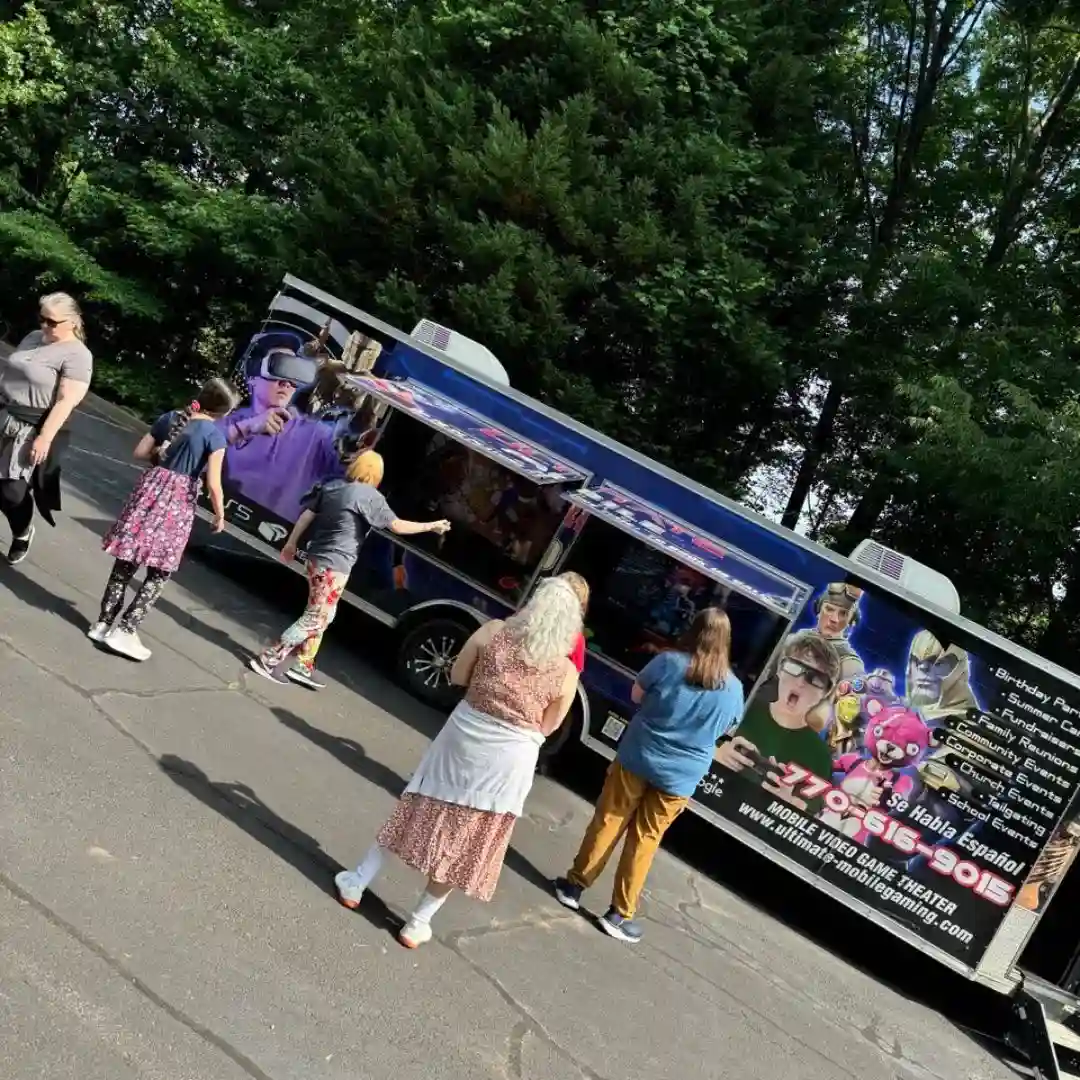 mobile gaming truck, video game truck, mobile gaming, party entertainment, birthday party, corporate event, family fun, game truck rental, gaming experience, Atlanta, Georgia, luxury gaming, PlayStation, Xbox, Nintendo Switch, virtual reality, video games, fun, excitement, celebration