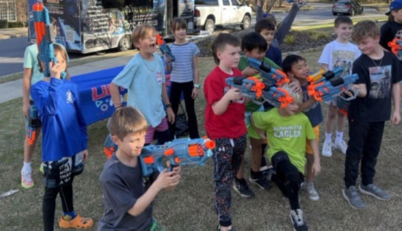 Students enjoying PTA event entertainment in Atlanta