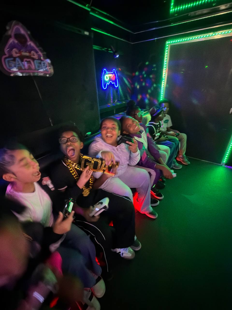 Students participating in supervised mobile entertainment at a school event